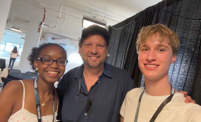 Evan Morris in a selfie with another student and an organizer at the National STEM Festival